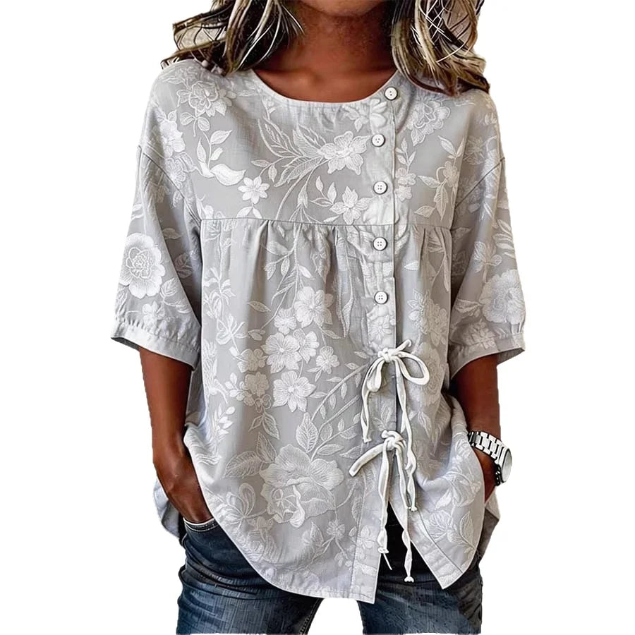 Celeste / Blusa floral elegante