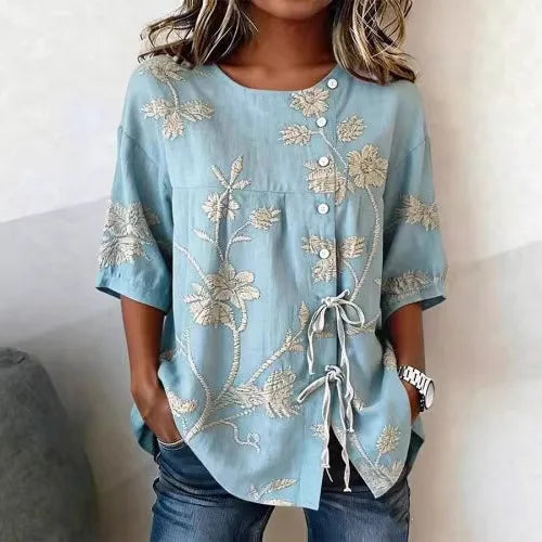 Celeste / Blusa floral elegante
