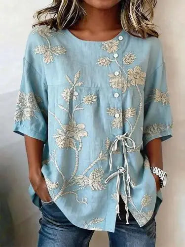 Celeste / Blusa floral elegante