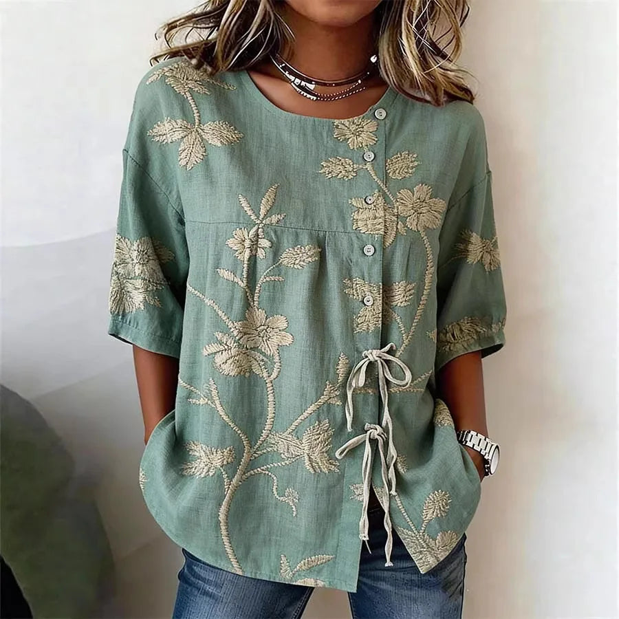 Celeste / Blusa floral elegante